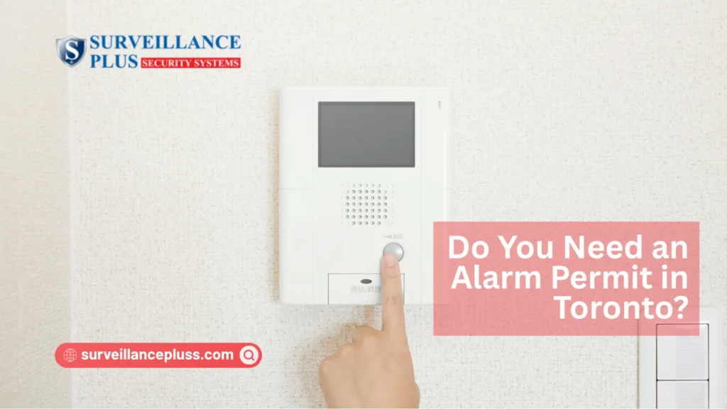 Technician installing a home security system in a Toronto house